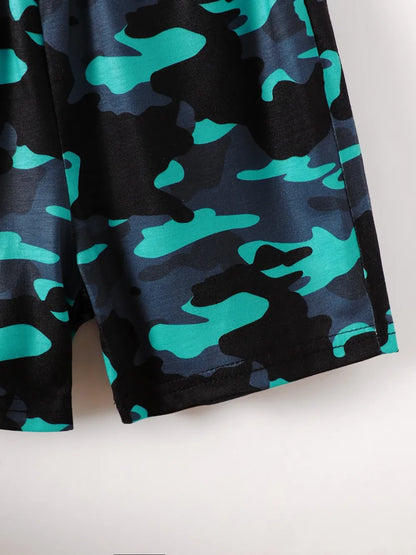 Camo-patterned shorts featuring shades of blue and black with a smooth fabric texture.